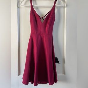 NWT skater dress with open but straps back. Super cute but too tight on me.
